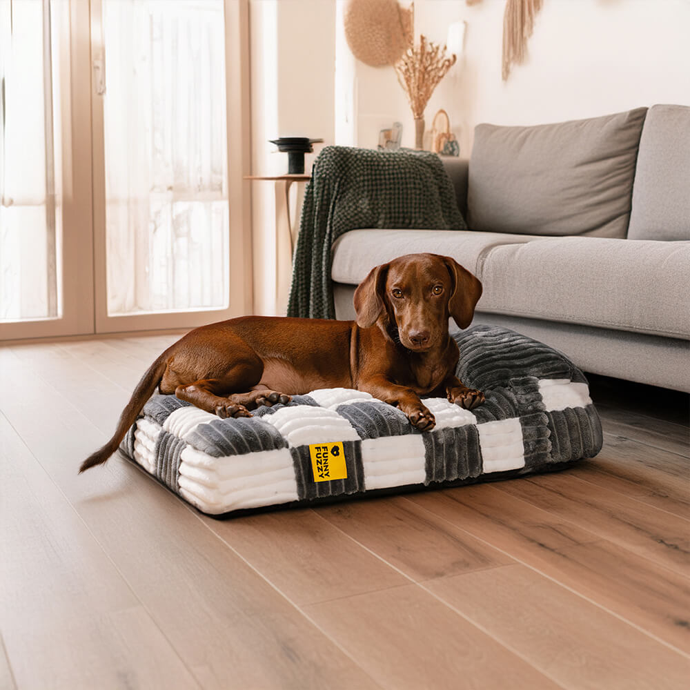 Premium pet bed: orthopedic plush chessboard pattern, anti-slip bottom, with a comfy pillow.