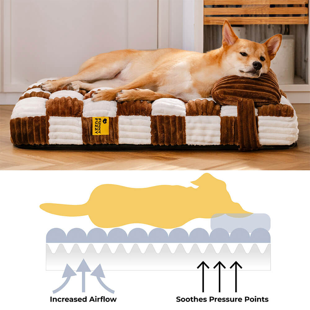 Dog bed for joint support: orthopedic plush chessboard design with an integrated pillow.