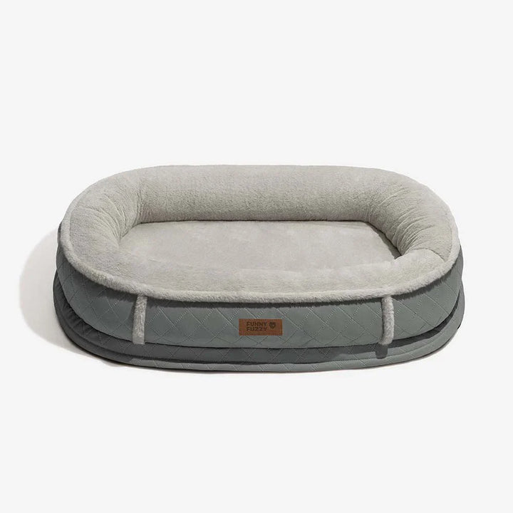 Orthopedic pet bed with a contrasting faux leather border, adding style to pet supplies
