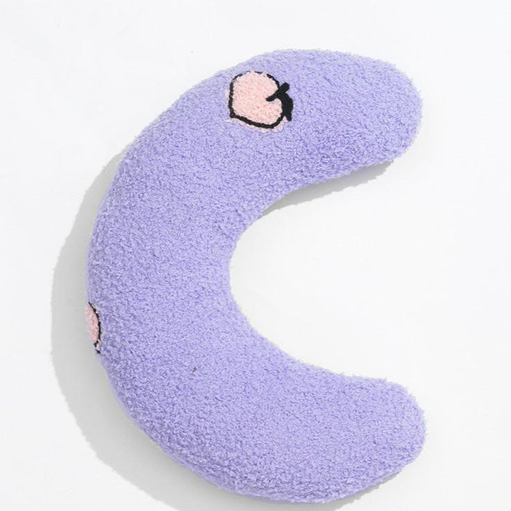 U-shaped pet bed with thick bolsters, designed for optimal joint support and dog comfort.