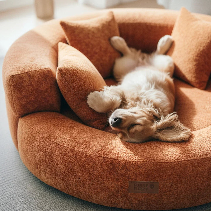 Orthopedic velvet donut dog bed unzipped, showing removable cover for easy washing and care.