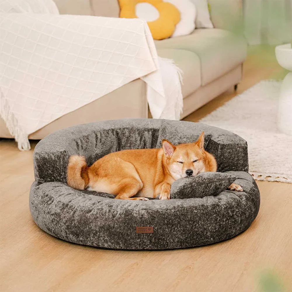 Elegant gray orthopedic velvet donut dog bed, perfect blend of style and pet comfort.