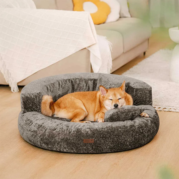 Elegant gray orthopedic velvet donut dog bed, perfect blend of style and pet comfort.