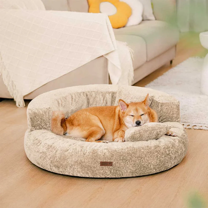 High-quality orthopedic velvet donut dog bed for pet joint health and supreme comfort.