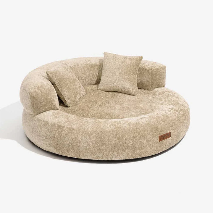 Complete view of washable orthopedic velvet donut dog bed with ample soft pillow support.