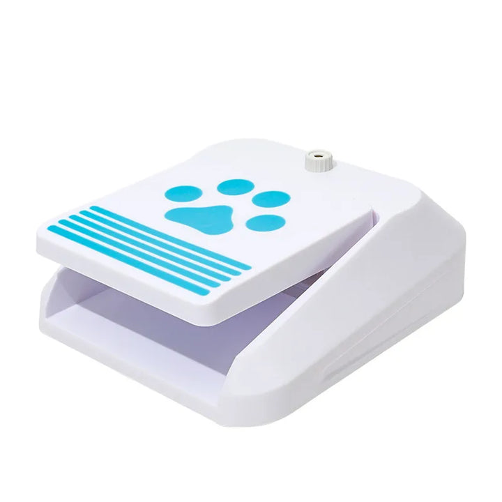 Paw activated dog water fountain for outdoor use, providing fresh water for pets.