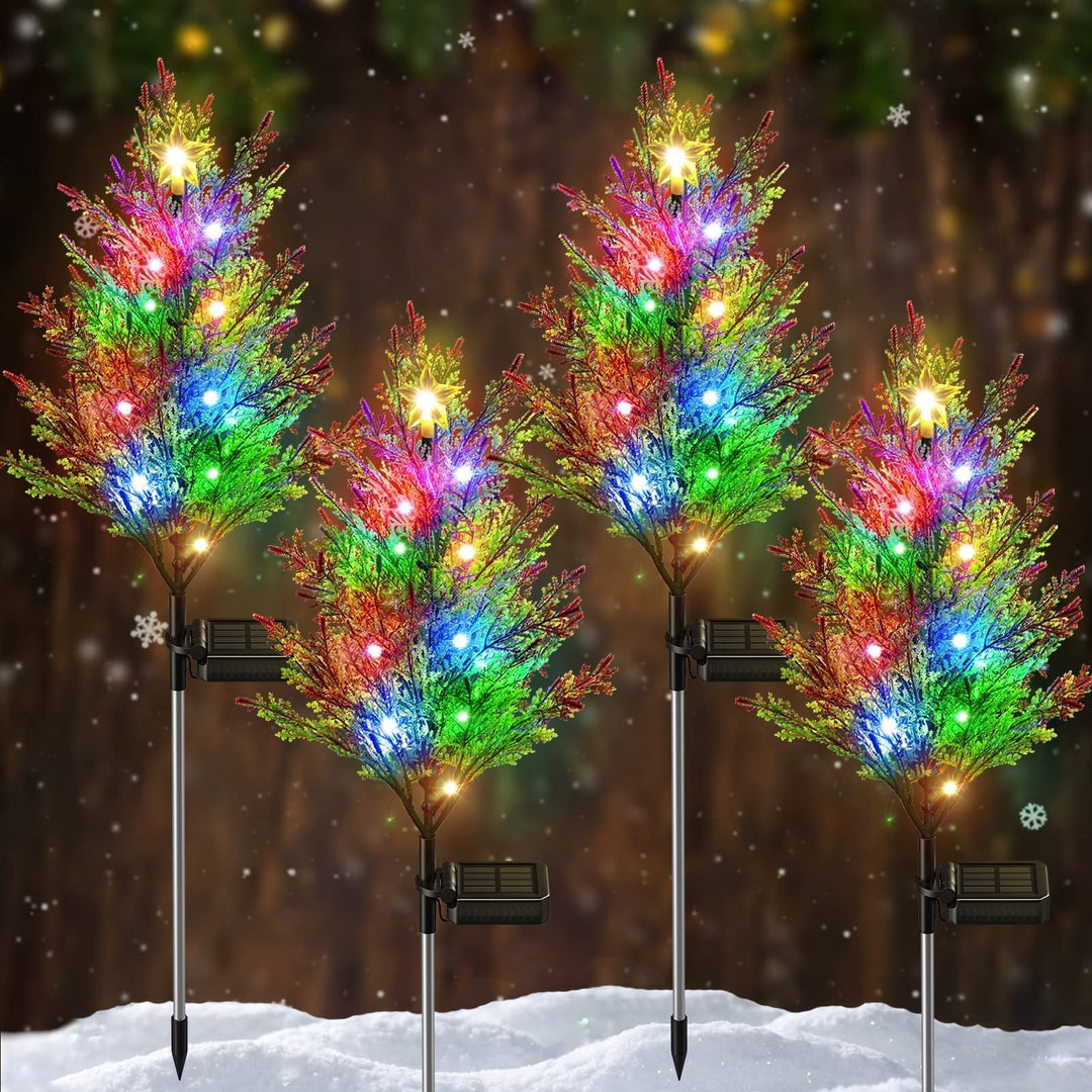 Outdoor solar cypress tree light illuminates a garden path with a starry glow, perfect lawn decor.