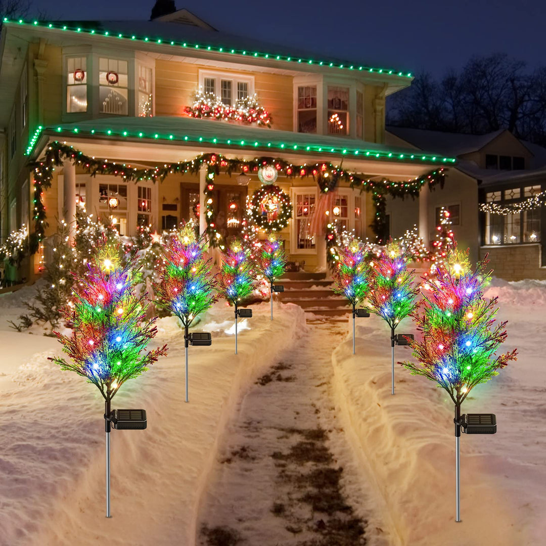 Stylish solar cypress tree light, providing a soft starry ambiance for any outdoor garden or patio setting.