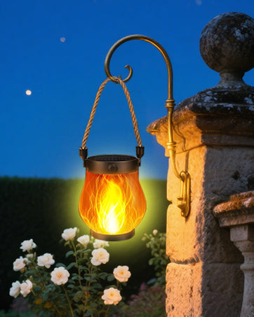 Compact outdoor solar flame lantern, creating enchanting light for tables or hanging