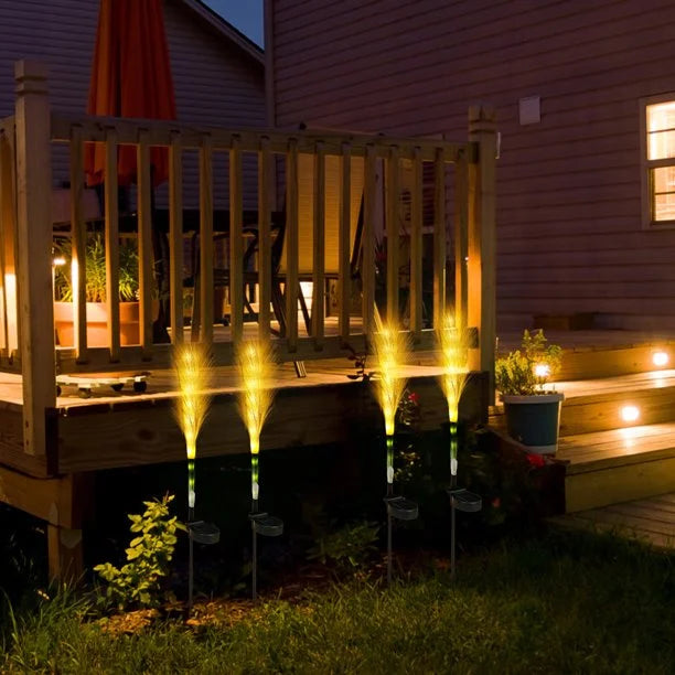 Close view of a solar-powered decorative reed light, featuring a durable, waterproof build.