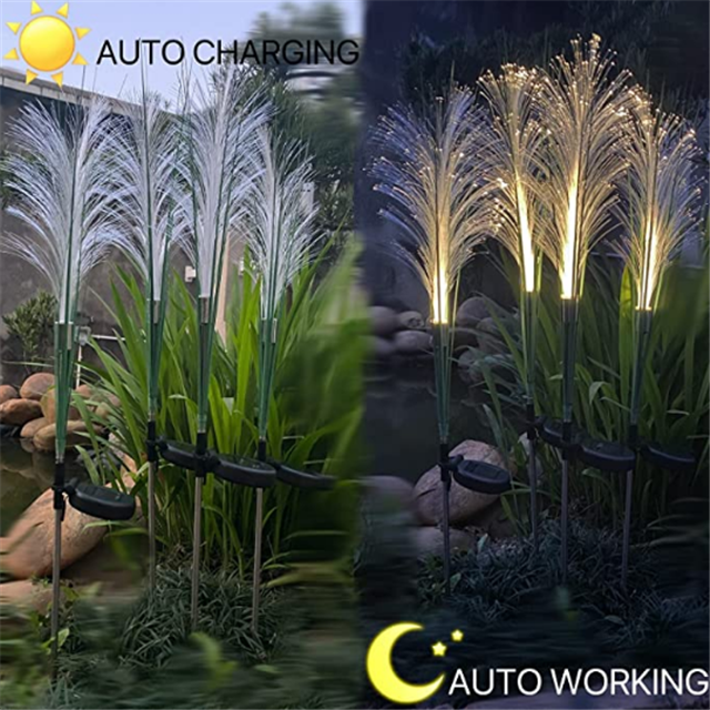 Set of three solar reed lights illuminating garden landscape at dusk, waterproof for lawn decor.