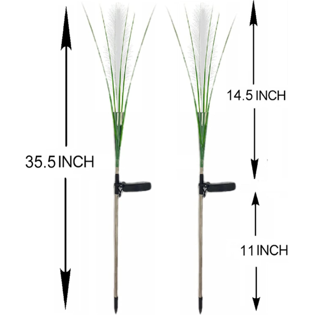 Energy efficient solar reed light, casting decorative shadows on a garden path at night.