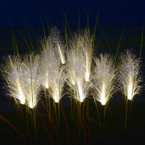 Detailed view of solar reed light stake, designed for easy installation in garden or lawn.