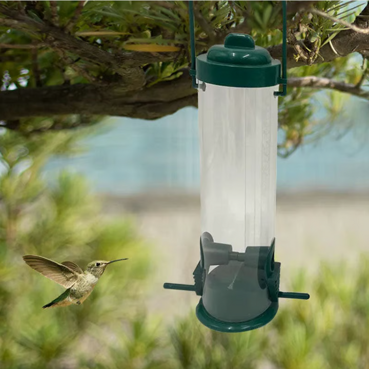 Detail of squirrel-proof mechanism on bird feeder, preventing access by larger animals, garden