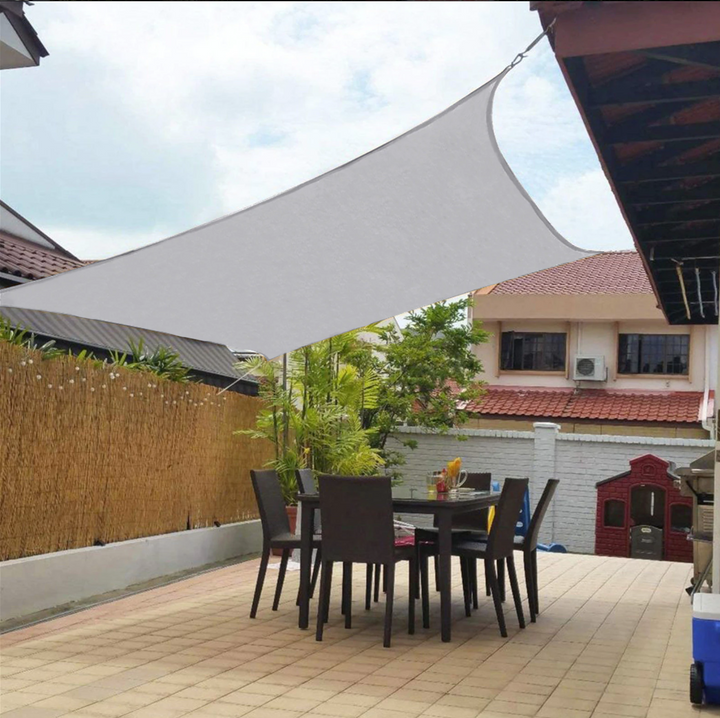 Outdoor UV protection shade sail, waterproof design for garden and patio areas. Blocks harmful sun.