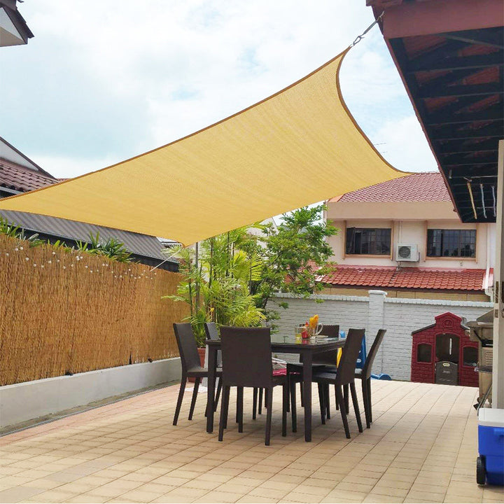 Sun shade sail offering superior UV protection for backyard patios. Waterproof and ideal for summer.