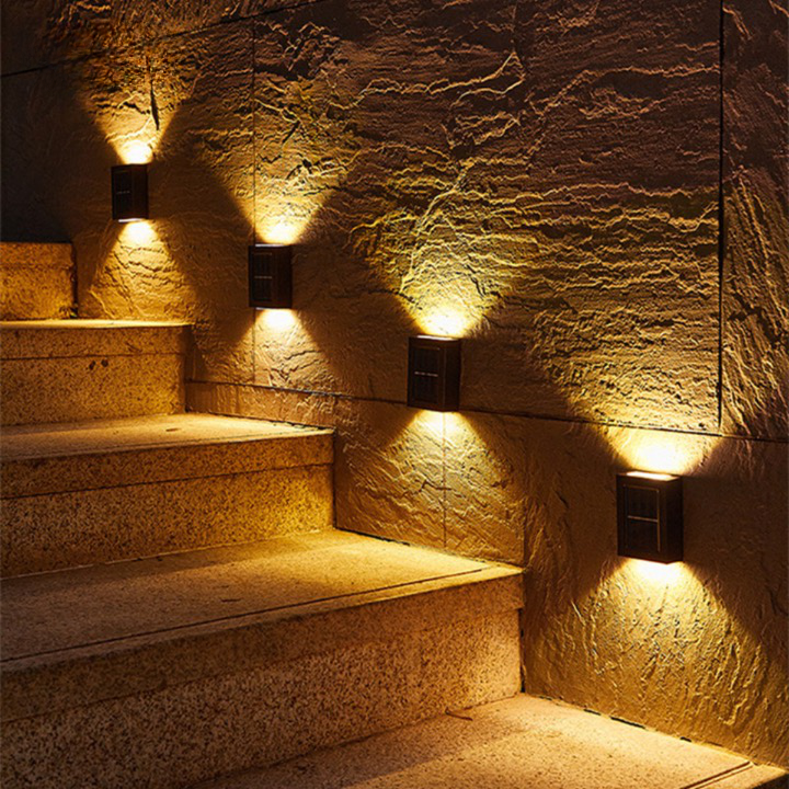 Outdoor wireless solar LED wall lamp for garden lighting & home security, energy-efficient.