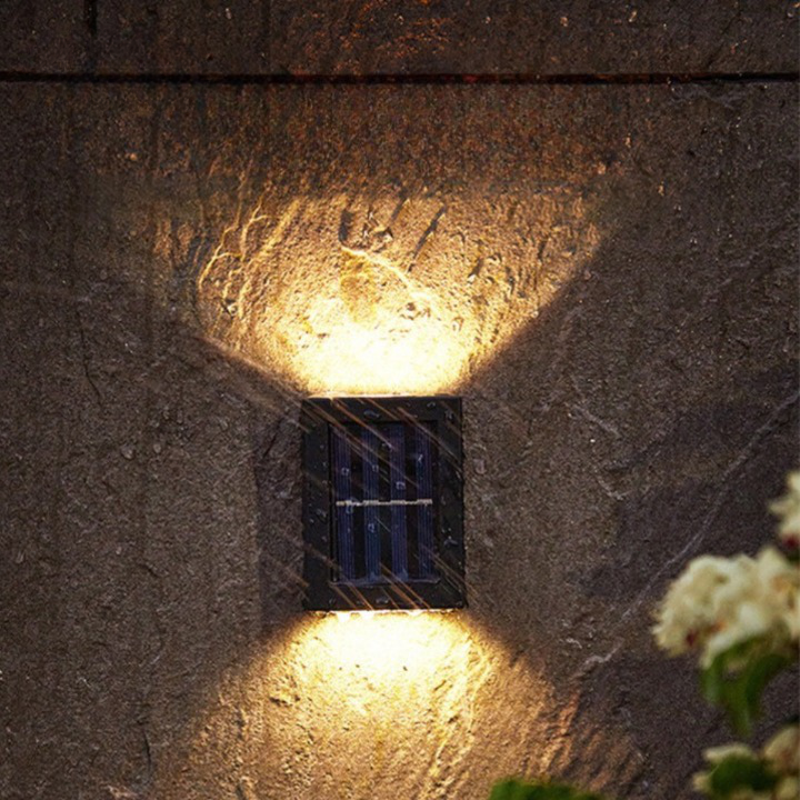 Modern outdoor wireless solar LED wall light for patio, deck, or fence. Bright, energy-saving garden lighting.
