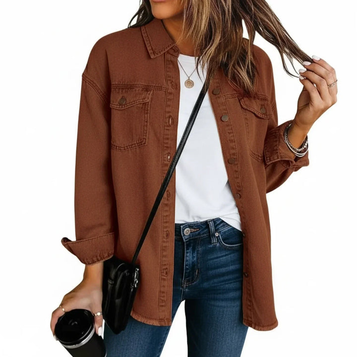 Casual chic women's oversized shirt jacket, ideal for layering. Features button-down front & fringe.
