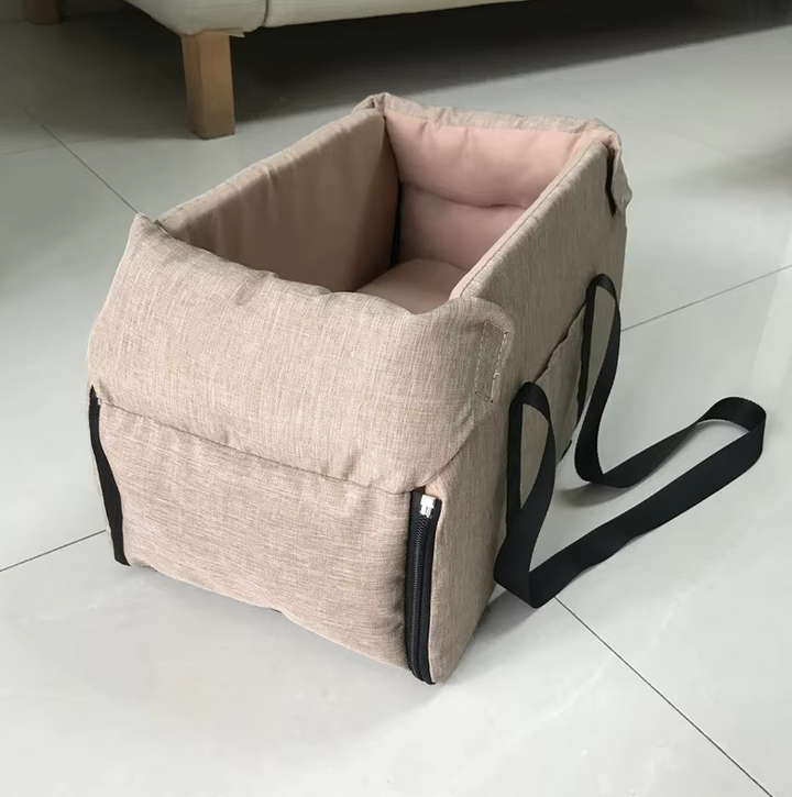 Empty padded dog car seat, ready for a pet, showcasing its secure and comfortable design.