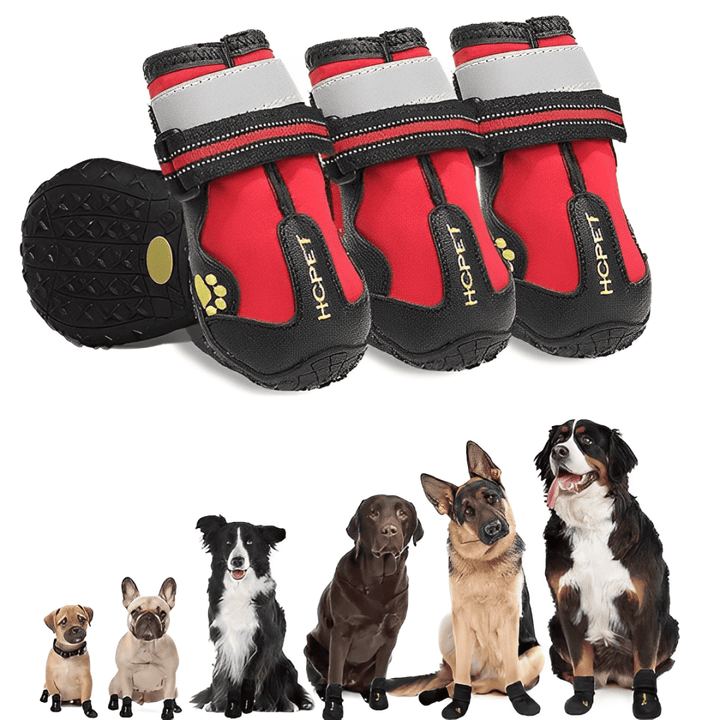 Pair of black waterproof non-slip dog boots with reflective straps for paw protection.