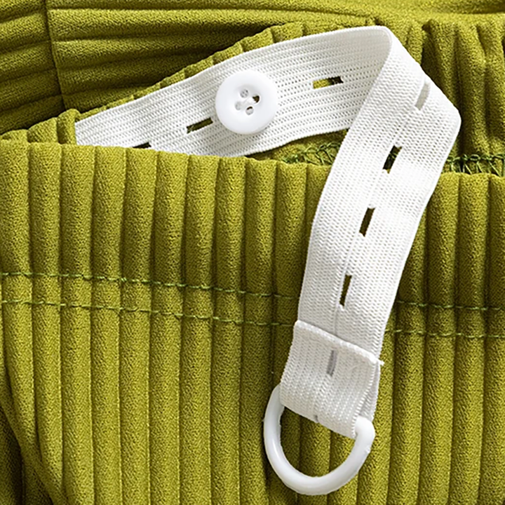 Expecting mom wearing stylish wide-leg ribbed maternity pants, ideal for pregnancy fashion & comfort.