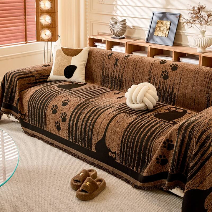 Soft chenille anti-scratch sofa cover with paw print design, suitable for pet-friendly homes.
