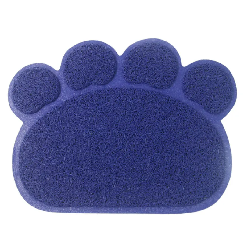 Close-up of a black paw-shaped litter mat, showcasing its textured surface for effective litter trapping.