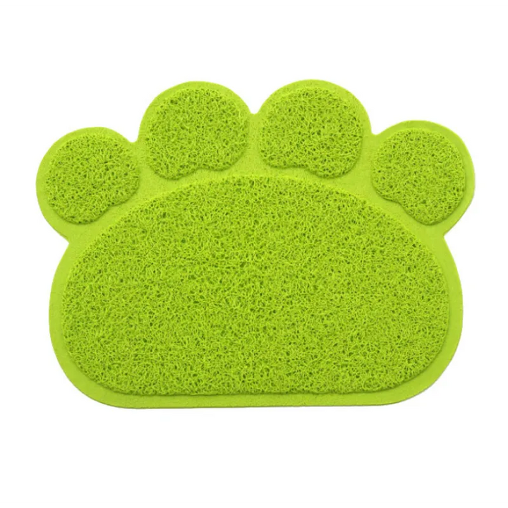 Top-down view of an extra-large paw-shaped cat litter mat, ideal pet supply for clean floors.