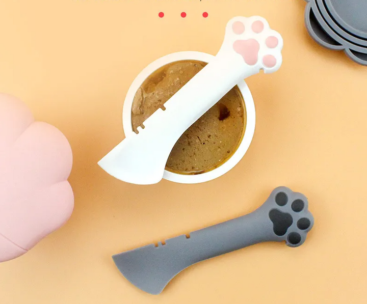 Durable silicone pet food dispenser & can opener tool, green, simplifies mealtime.