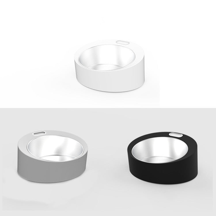 Smart dog feeder and pet scale by PawScale, showing a full stainless steel bowl for pet nutrition.