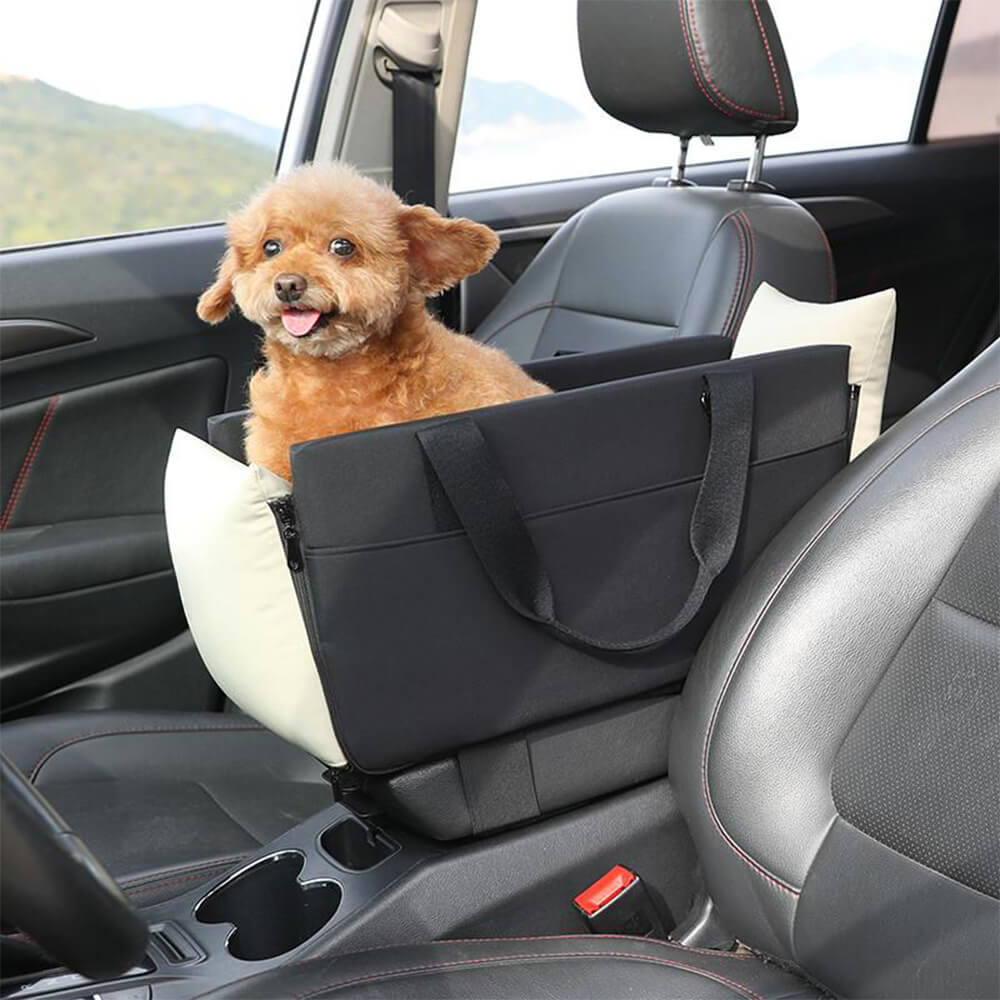 Pet gear: console travel carrier for dogs and cats, featuring secure straps and soft lining.