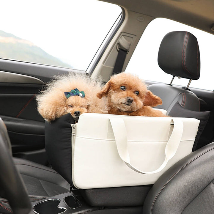 Portable pet console carrier for car armrest, suitable for cat travel and small dog safety.