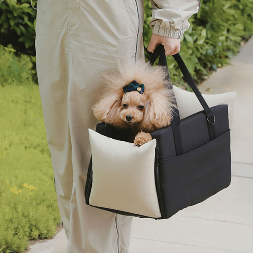 Dog car seat for console, waterproof and portable pet accessory for vehicle travel.