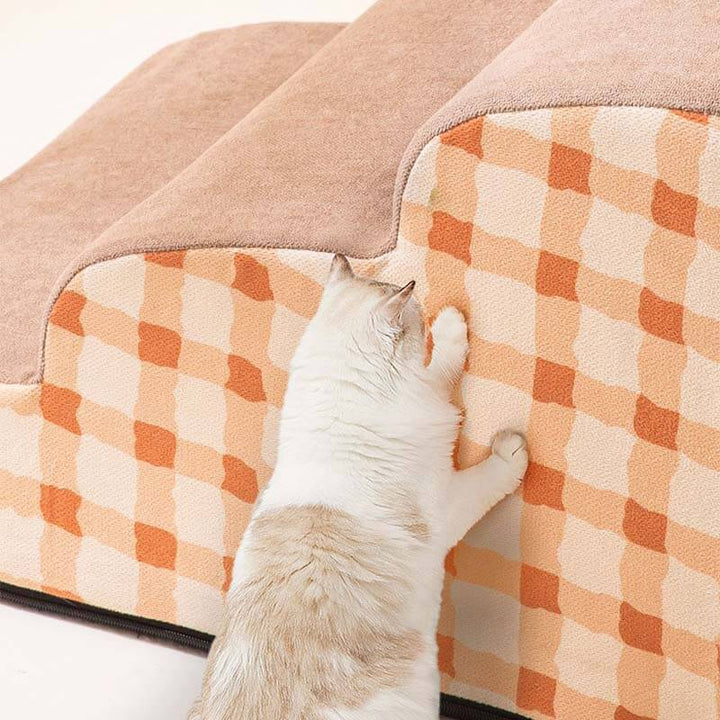Dog and cat mobility aid: foam pet stairs with a beige removable cover, enhancing pet independence.