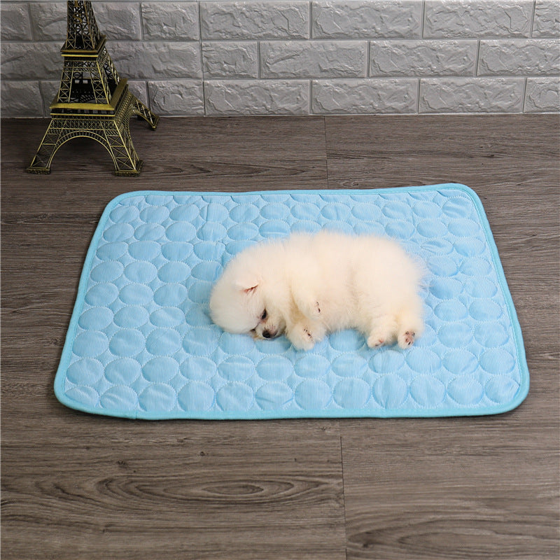 Portable pet cooling mat, ideal for summer travel, easy to wipe clean, keeps dogs & cats cool.
