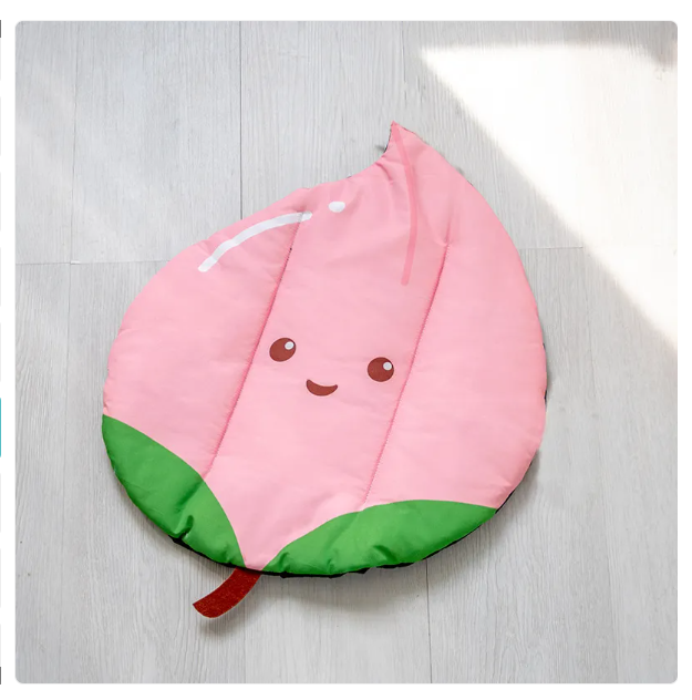 Pet bed cooling mat with a fun mixed fruit design for ultimate animal comfort