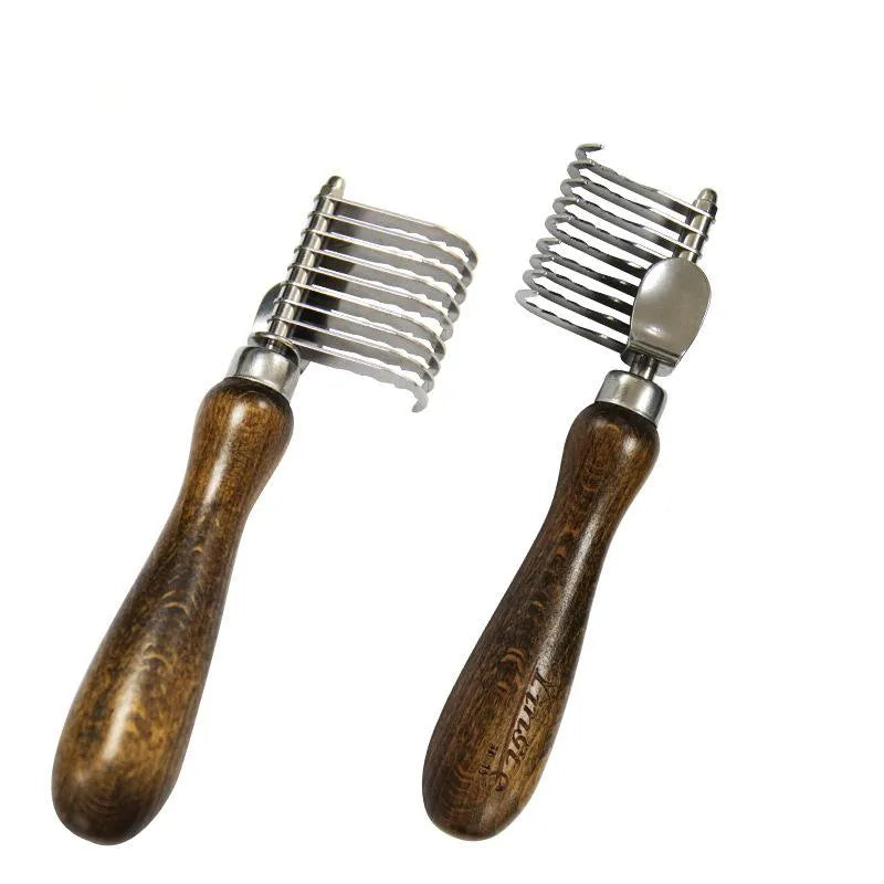 Close-up of pet detangling comb showing polished stainless steel teeth and wooden handle