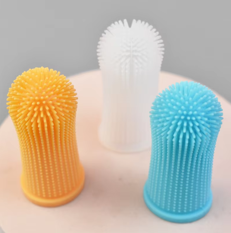 Pet finger toothbrush designed for small and large dogs, and cats, ensuring comprehensive dental care.
