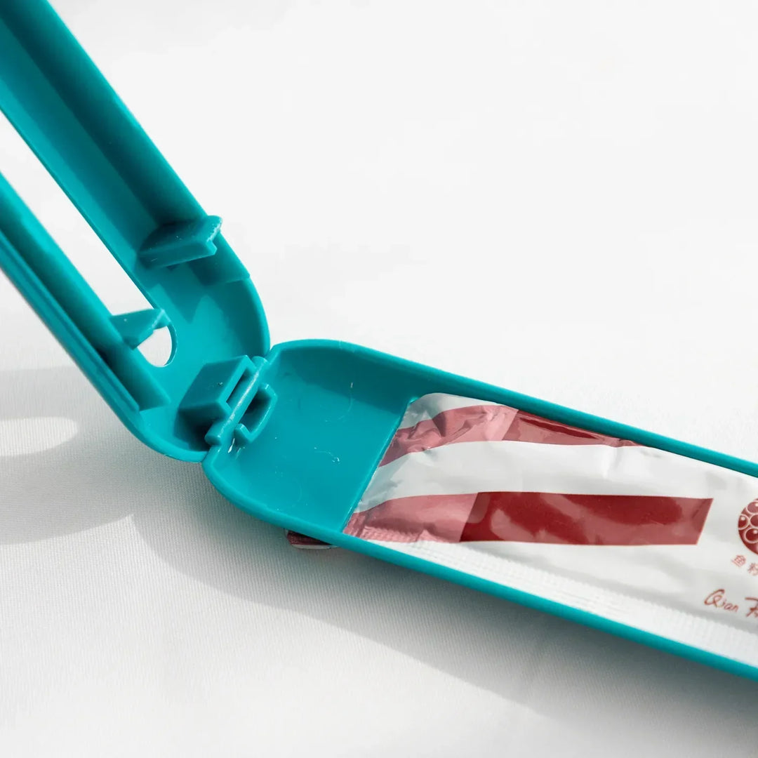 Ergonomic pet food scoop with slider for accurate meal portions for cats and dogs