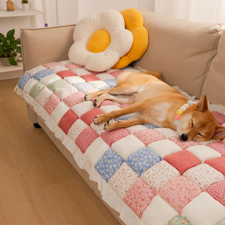 Close-up of the soft, durable cotton fabric of the pet-friendly sofa protector