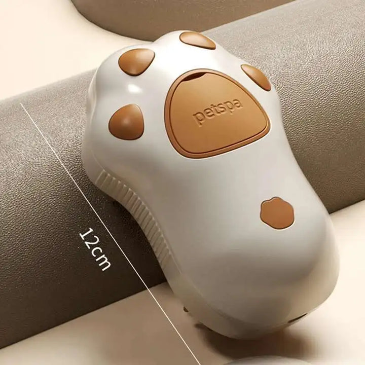 Display of a pet grooming brush alongside dog supplies, highlighting its use for hair removal & massage.