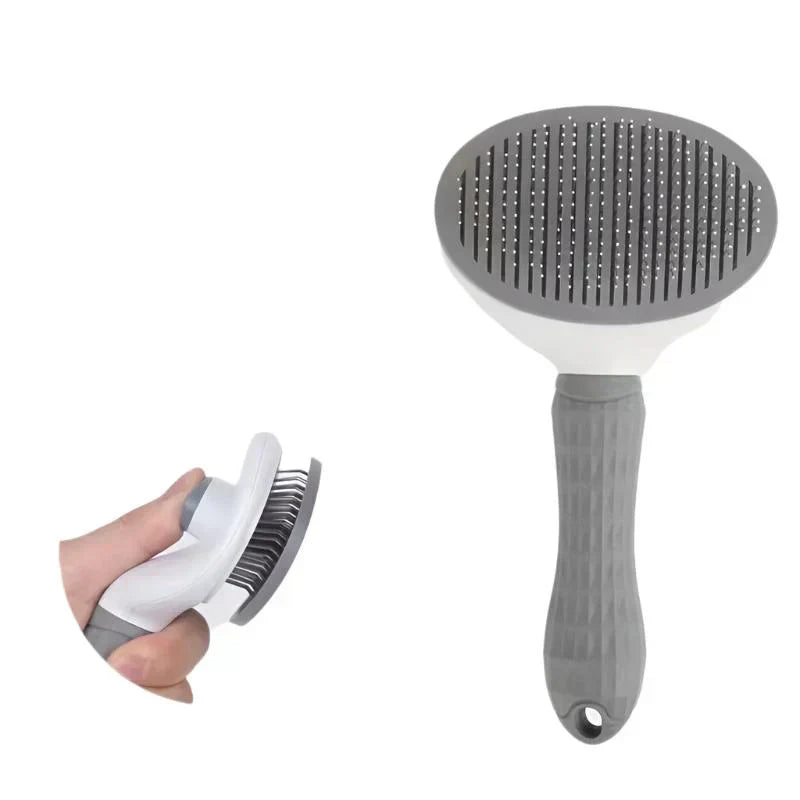 Detail of the self-cleaning mechanism on a pet grooming brush, ensuring easy fur removal