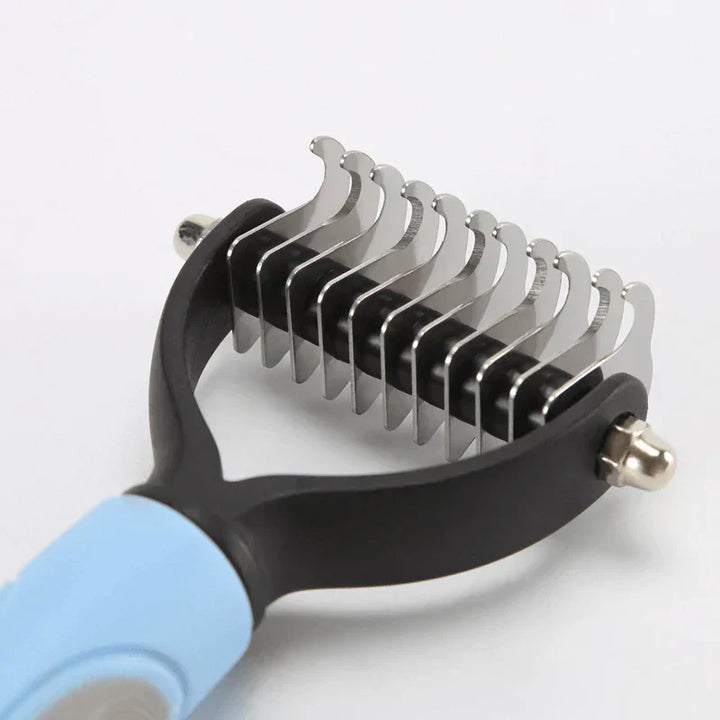 Professional pet grooming detangling comb with comfortable grip for easy pet hair removal.