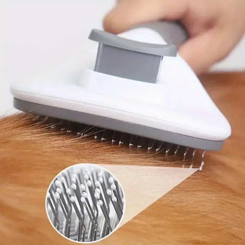 Person using a pet grooming dog and cat brush to remove loose fur, pet care shedding tool