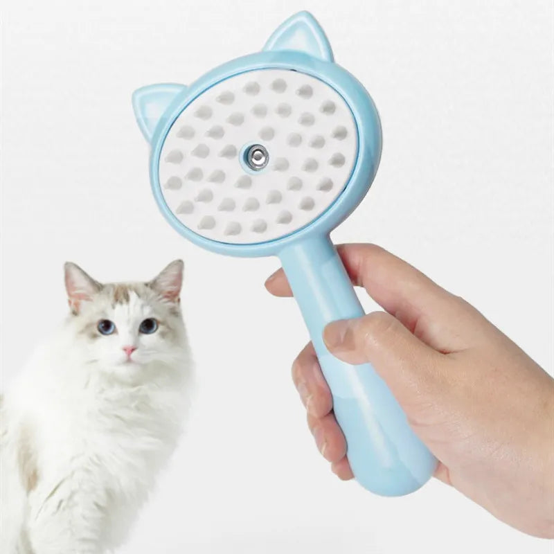 Hand holding pet grooming spray brush, showing easy-clean water tank feature