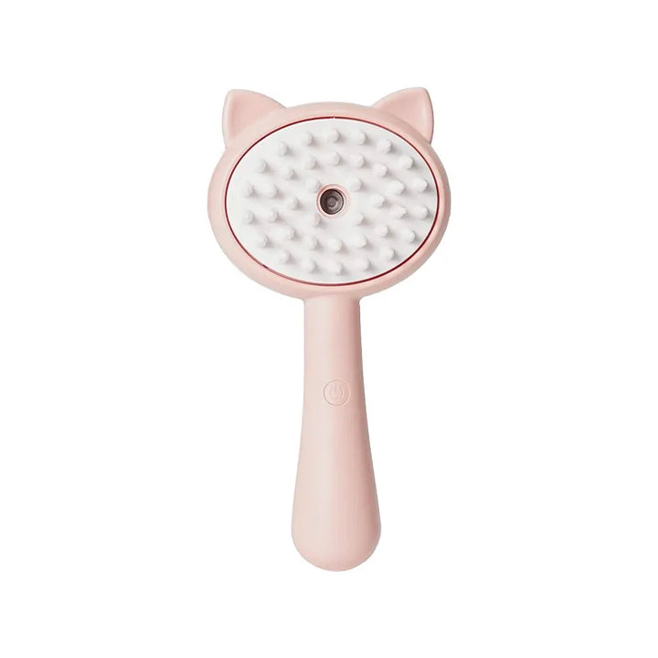 Cat being groomed with a portable pet spray brush, gentle silicone massage