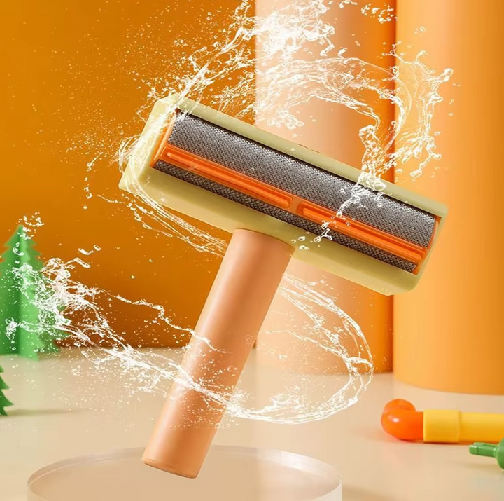 Pet grooming vacuum designed as a toy, encouraging playful interaction during hair removal
