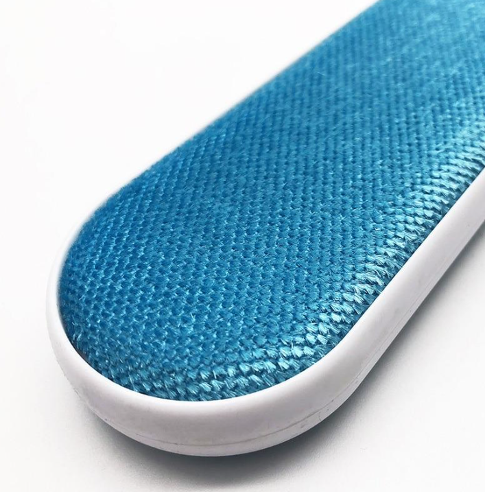 Close-up of pet hair stuck to the fur remover, showcasing efficient dog and cat hair removal