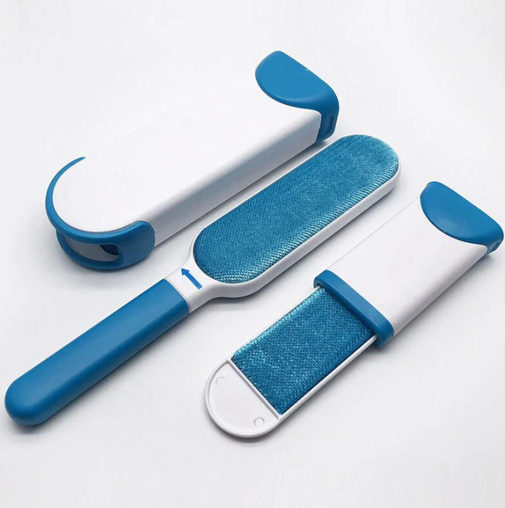 Pet hair remover gliding over a dark couch, cleaning pet fur, furniture protection supplies